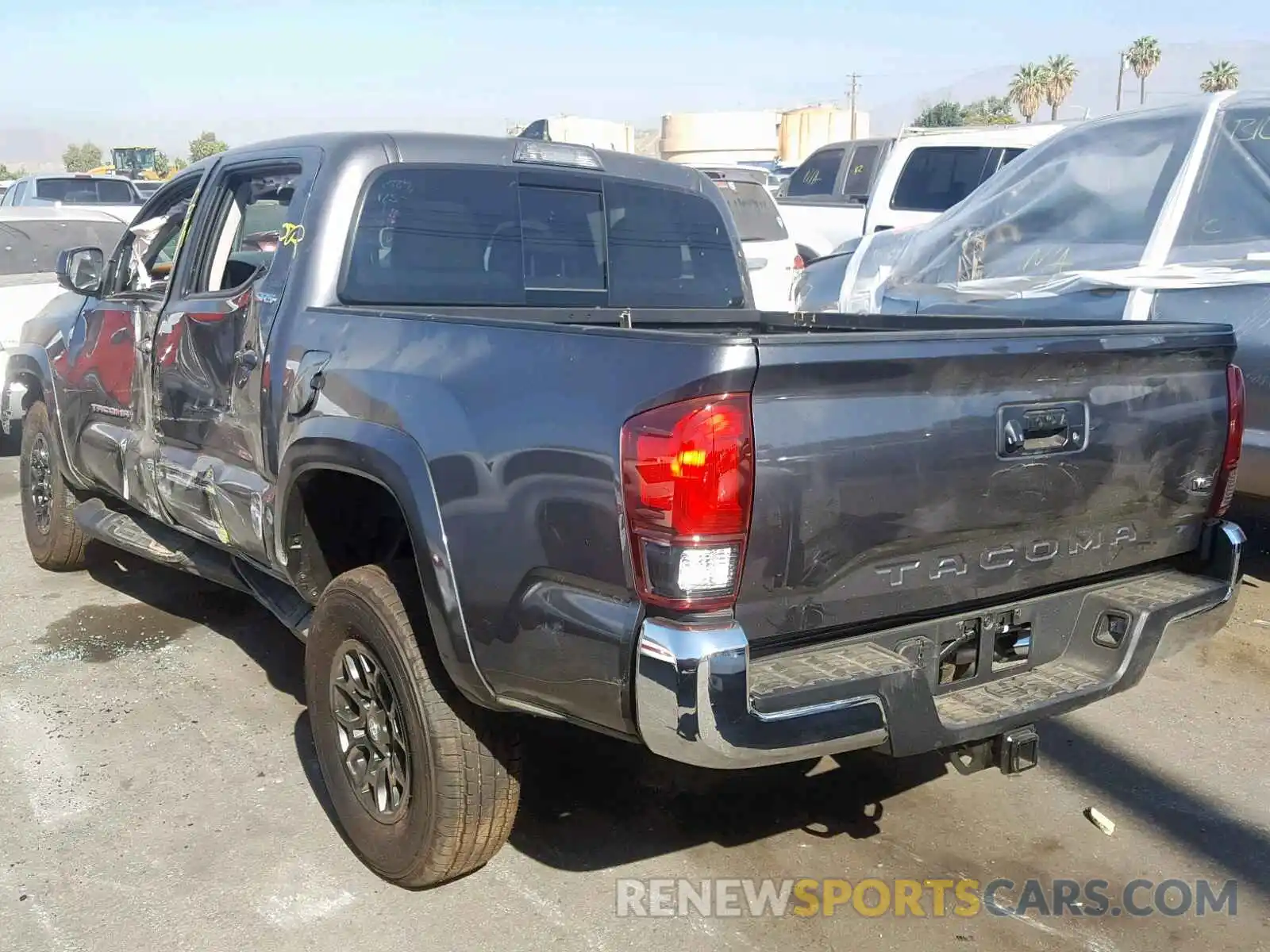 3 Photograph of a damaged car 5TFAZ5CN4KX083246 TOYOTA TACOMA DOU 2019