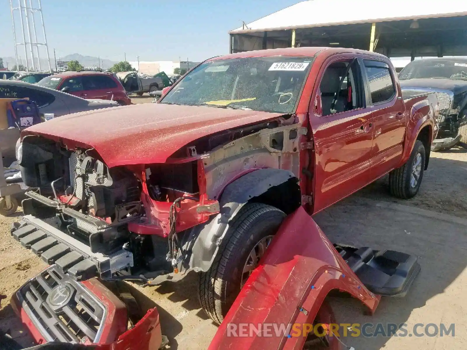 2 Photograph of a damaged car 5TFAZ5CN9KX077300 TOYOTA TACOMA DOU 2019