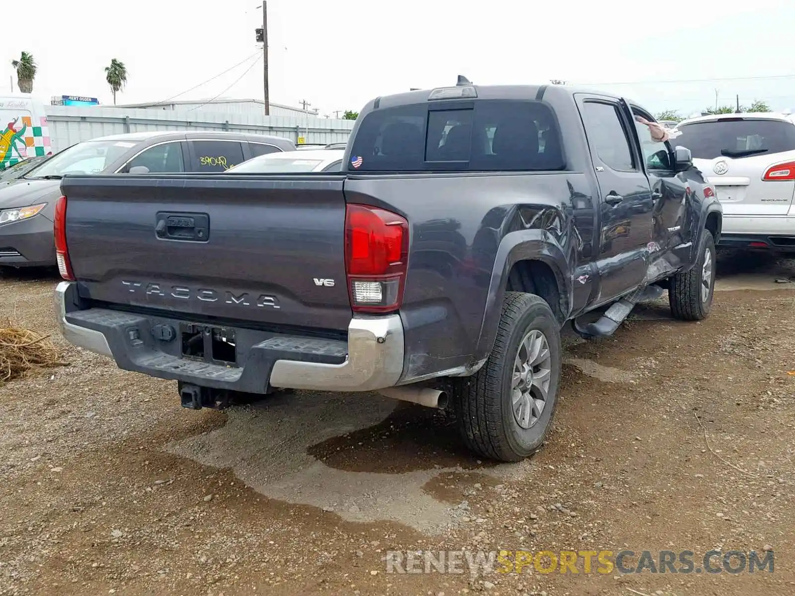 4 Photograph of a damaged car 5TFBZ5DN6KX004503 TOYOTA TACOMA DOU 2019