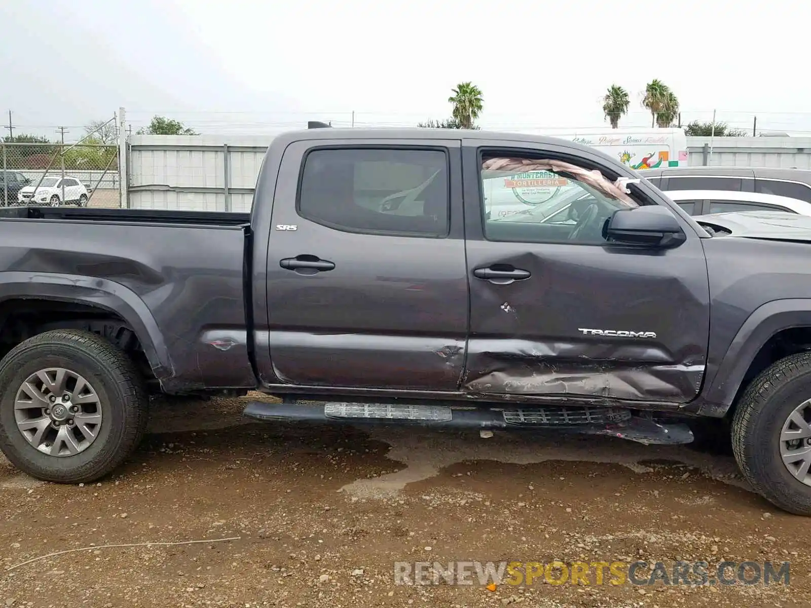 9 Photograph of a damaged car 5TFBZ5DN6KX004503 TOYOTA TACOMA DOU 2019