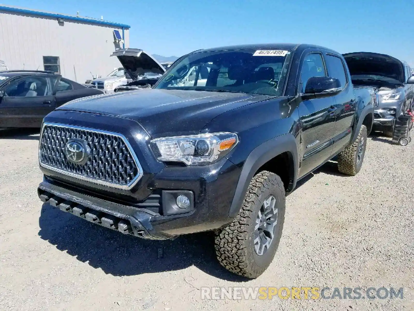 2 Photograph of a damaged car 5TFCZ5AN0KX183761 TOYOTA TACOMA DOU 2019