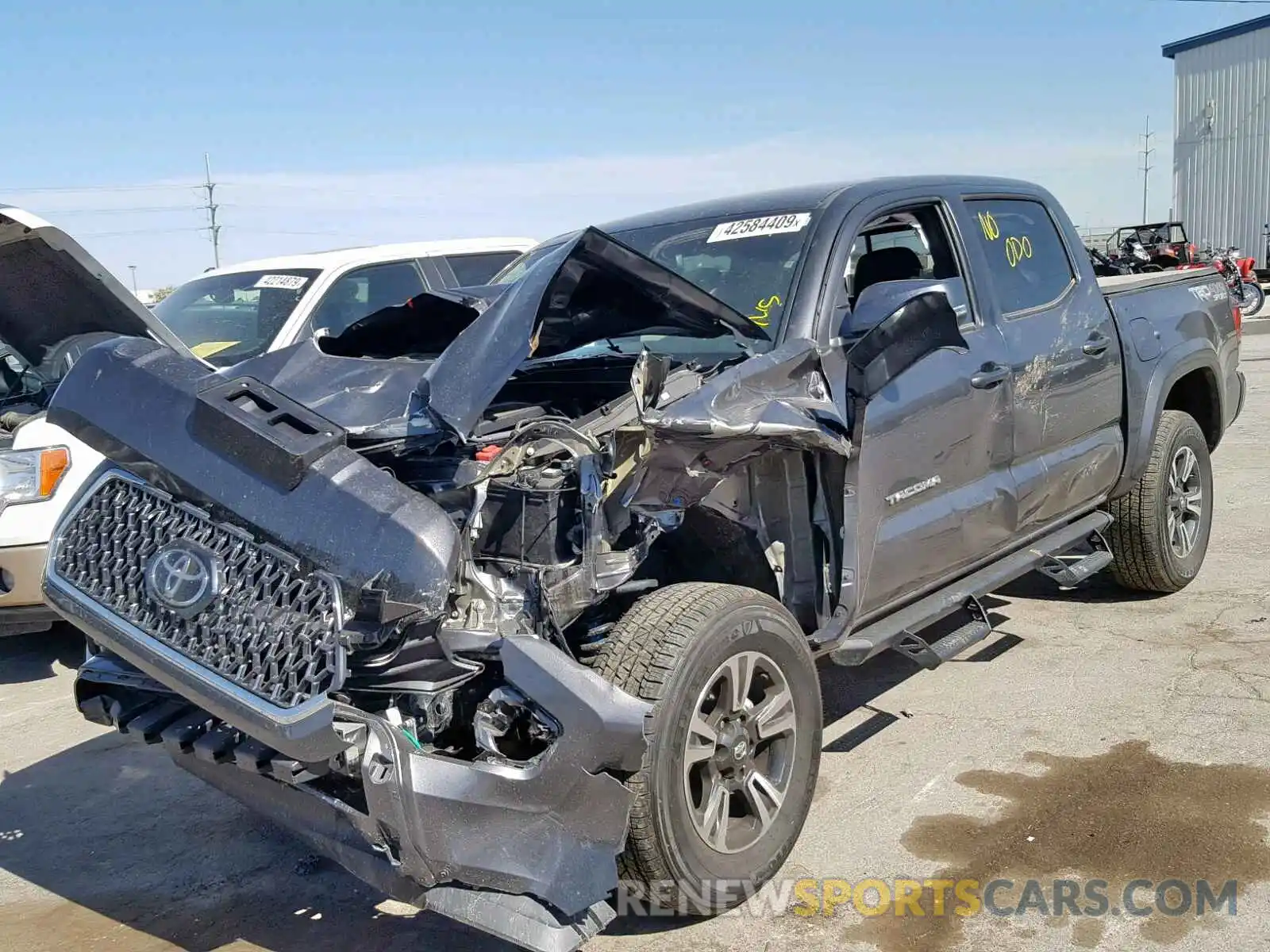 2 Photograph of a damaged car 5TFCZ5AN0KX188927 TOYOTA TACOMA DOU 2019