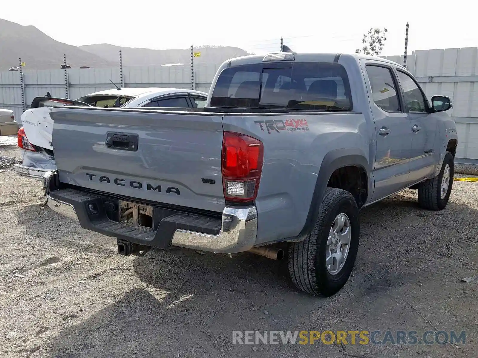 4 Photograph of a damaged car 5TFCZ5AN2KX178853 TOYOTA TACOMA DOU 2019