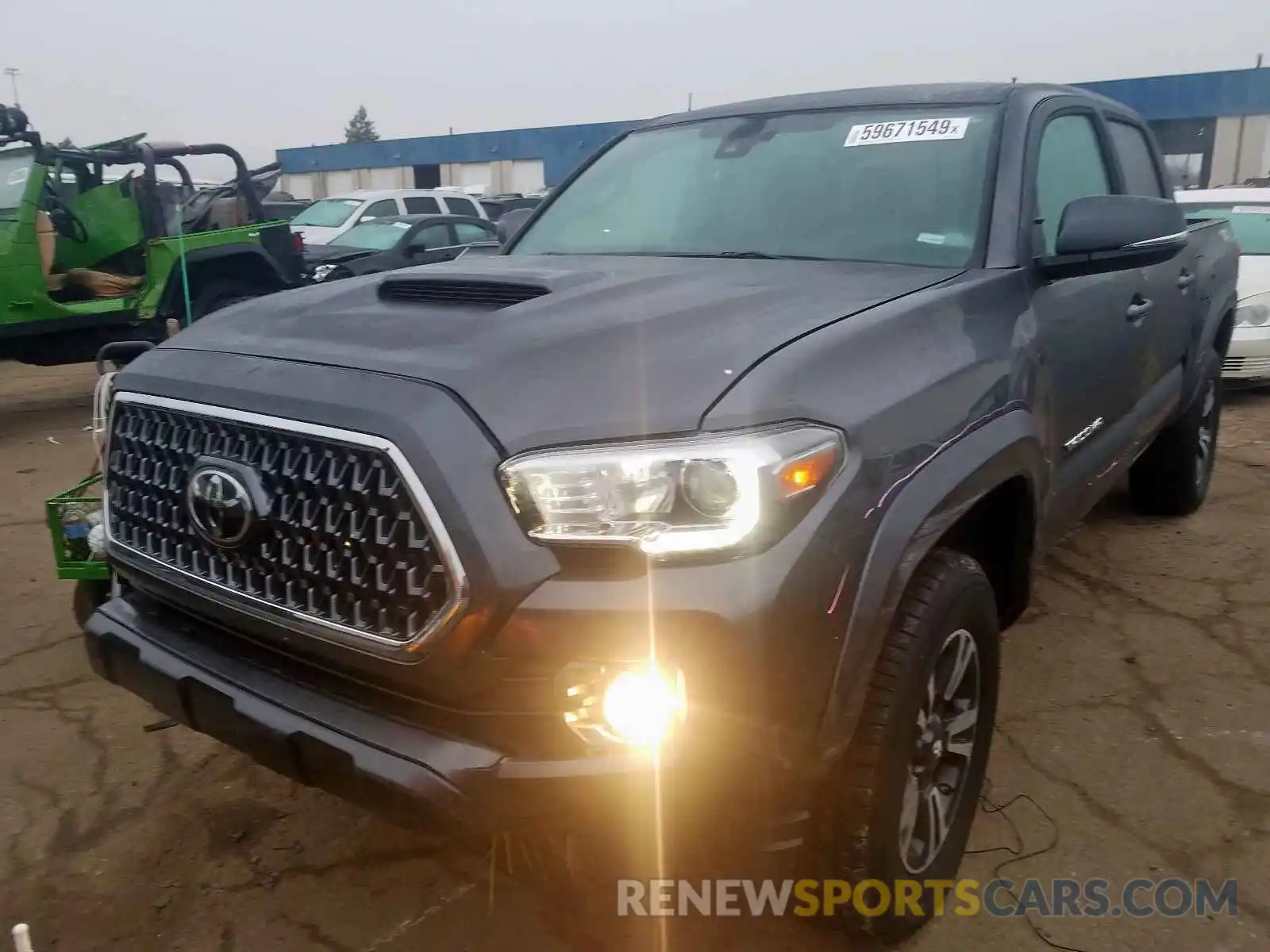 2 Photograph of a damaged car 5TFCZ5AN4KX191667 TOYOTA TACOMA DOU 2019