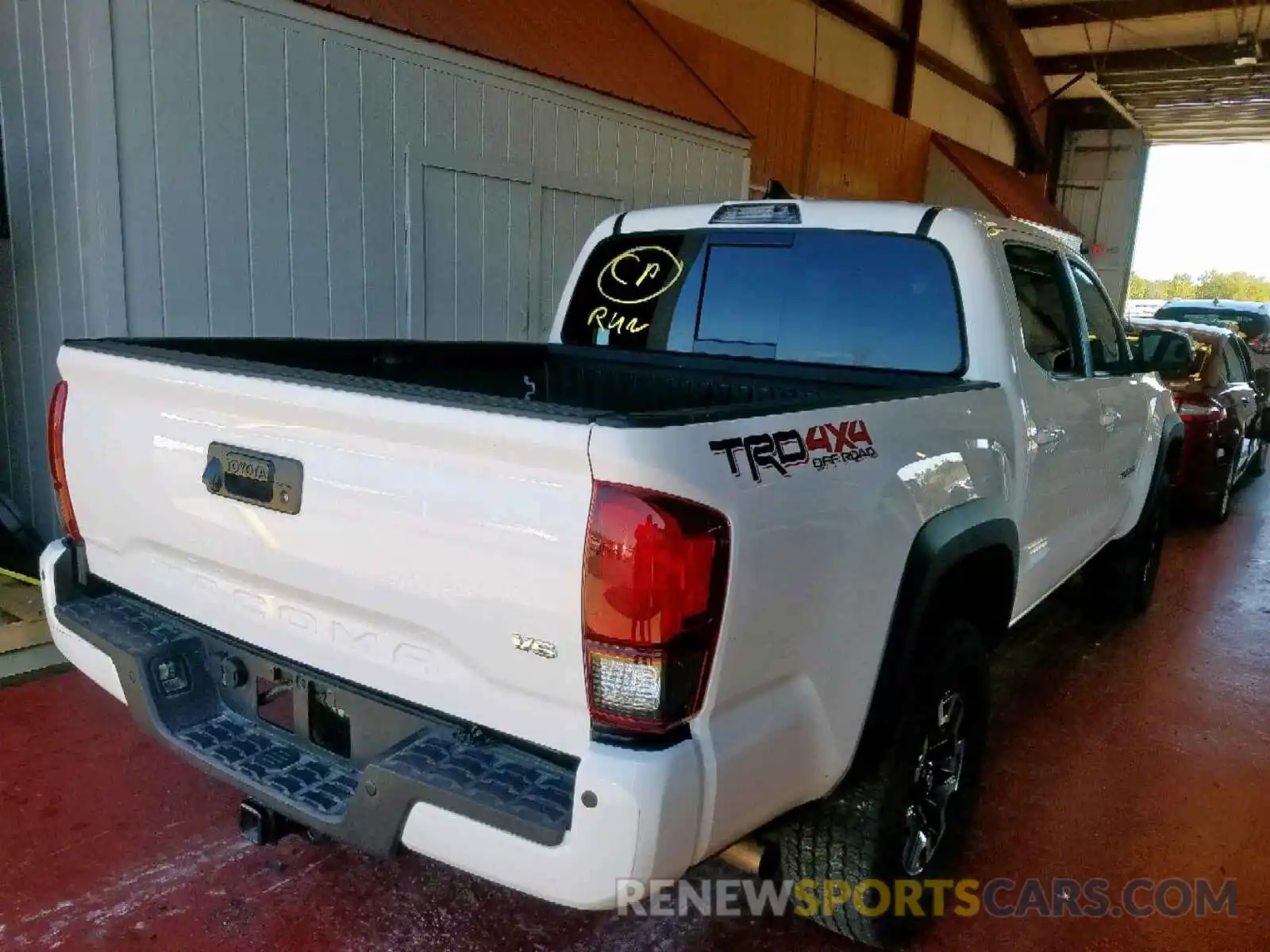 4 Photograph of a damaged car 5TFCZ5AN5KX172416 TOYOTA TACOMA DOU 2019