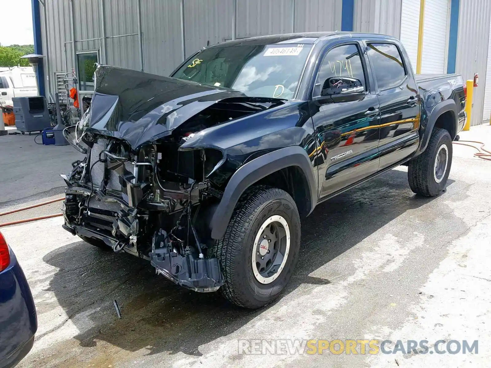 2 Photograph of a damaged car 5TFCZ5AN5KX185554 TOYOTA TACOMA DOU 2019