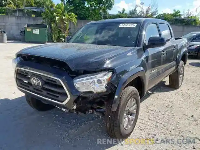 2 Photograph of a damaged car 5TFCZ5AN5KX187000 TOYOTA TACOMA DOU 2019