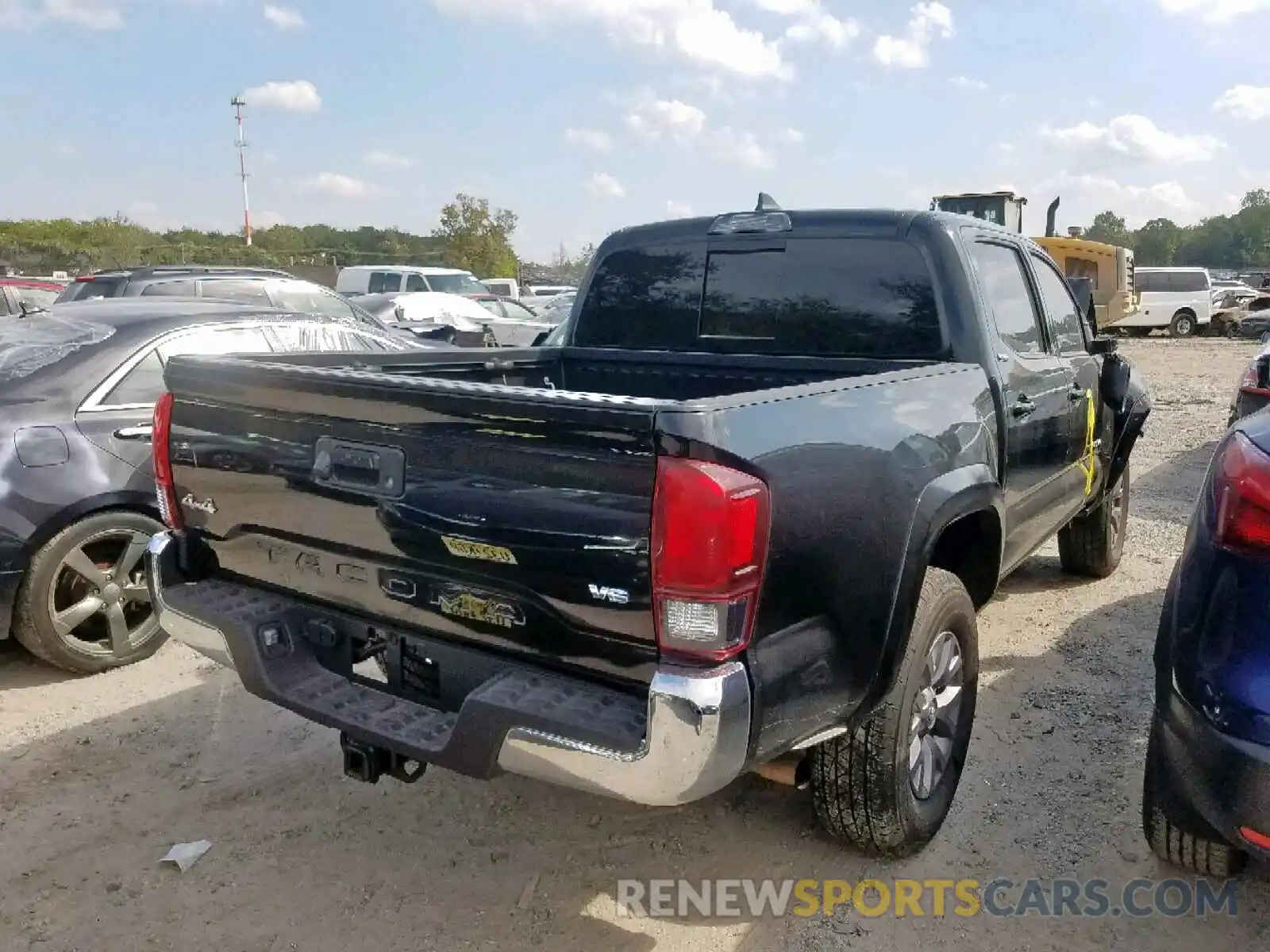 4 Photograph of a damaged car 5TFCZ5AN5KX196926 TOYOTA TACOMA DOU 2019