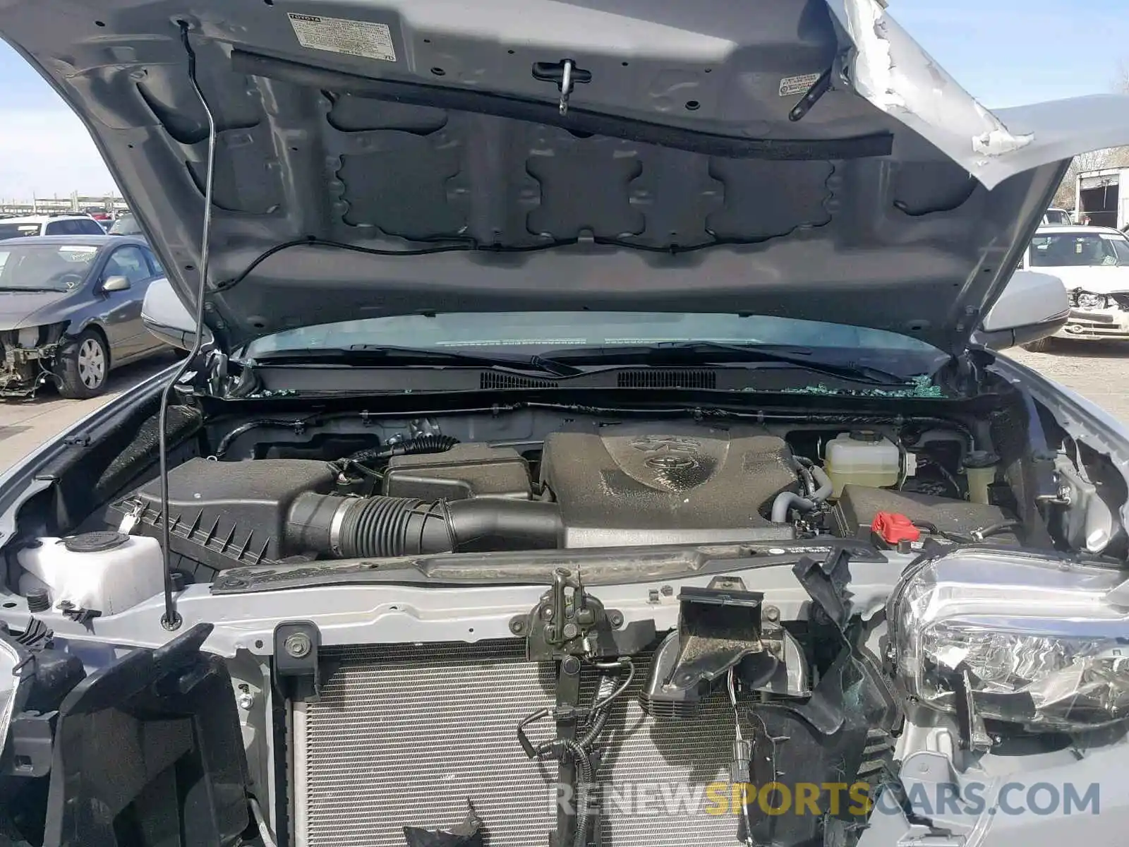 7 Photograph of a damaged car 5TFCZ5AN6KX177740 TOYOTA TACOMA DOU 2019