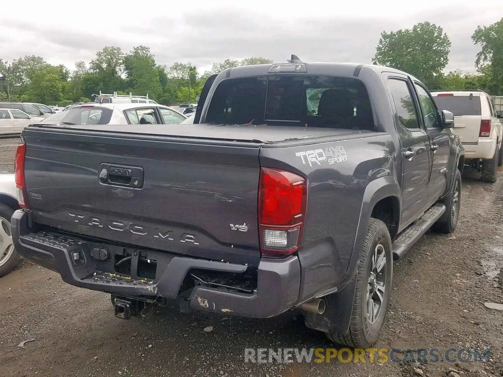 4 Photograph of a damaged car 5TFCZ5AN7KX187936 TOYOTA TACOMA DOU 2019