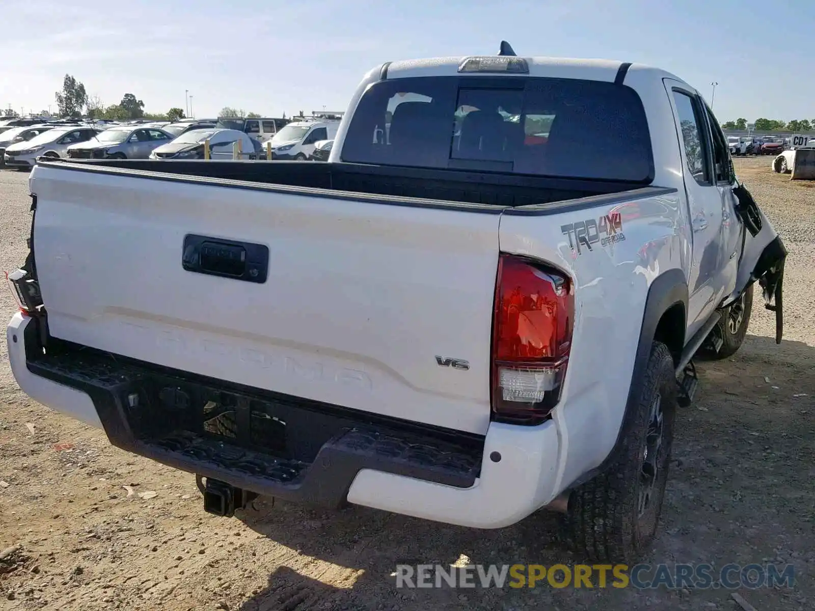 4 Photograph of a damaged car 5TFCZ5AN9KX188764 TOYOTA TACOMA DOU 2019