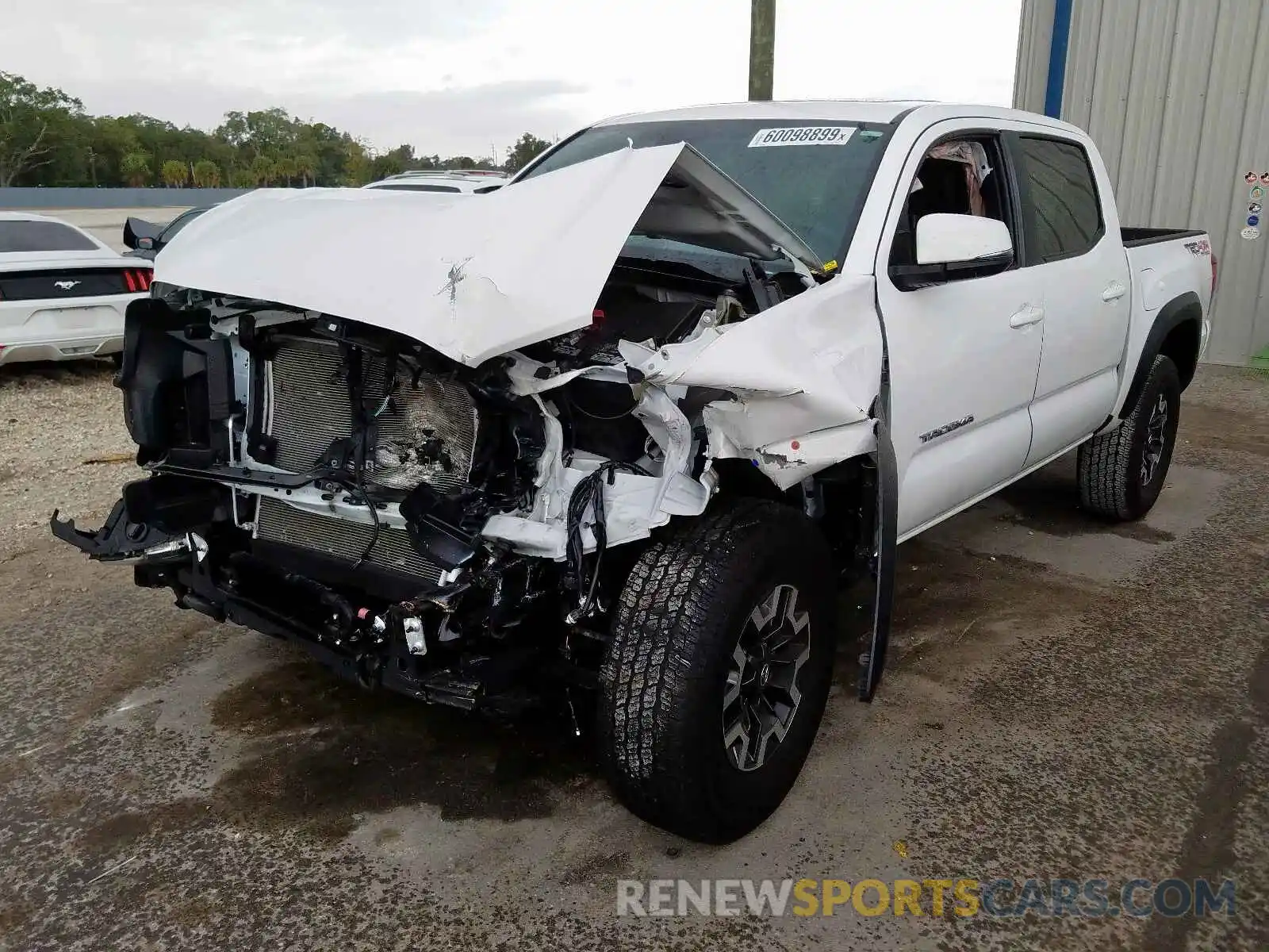 2 Photograph of a damaged car 5TFCZ5ANXKX169897 TOYOTA TACOMA DOU 2019