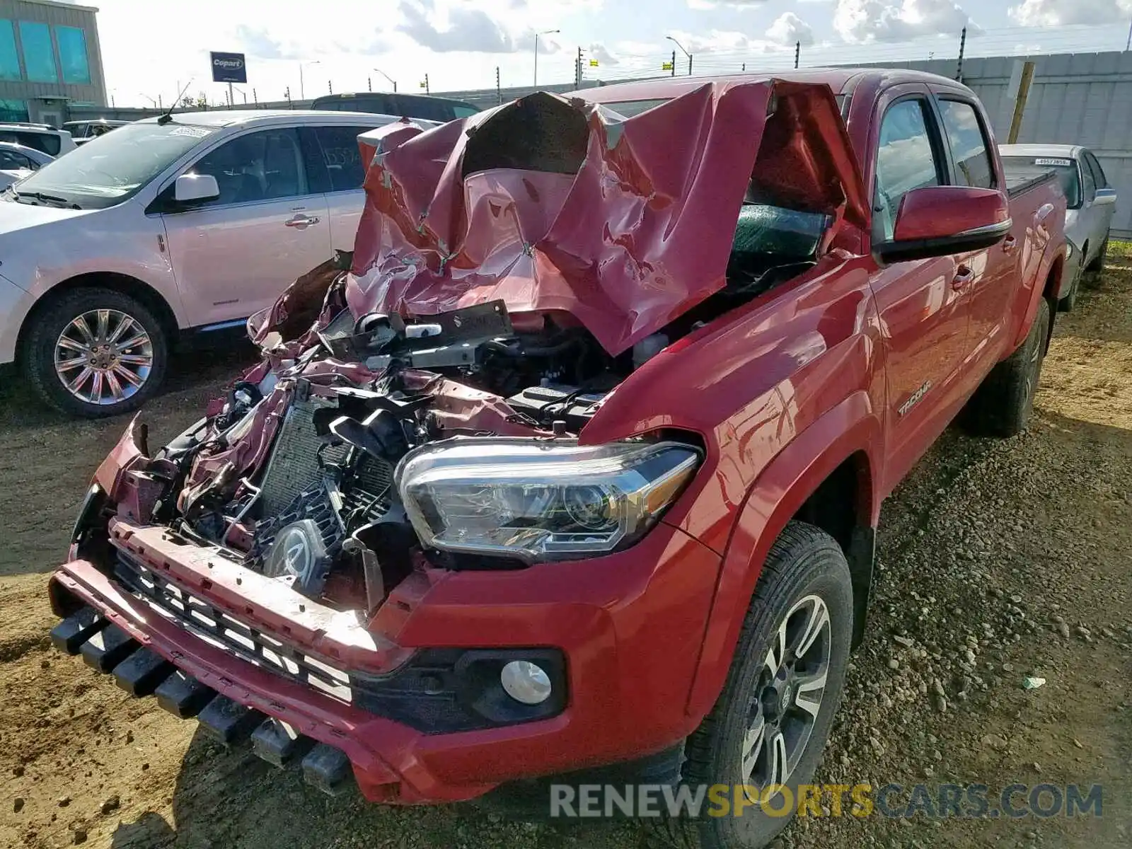 2 Photograph of a damaged car 5TFDZ5BN2KX042340 TOYOTA TACOMA DOU 2019