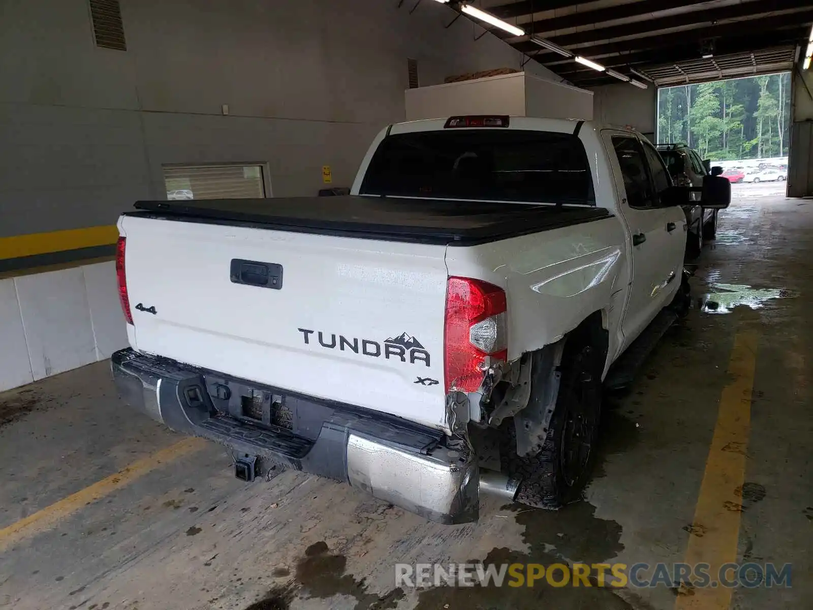 4 Photograph of a damaged car 5TFDW5F1XKX779902 TOYOTA TUNDRA 2019