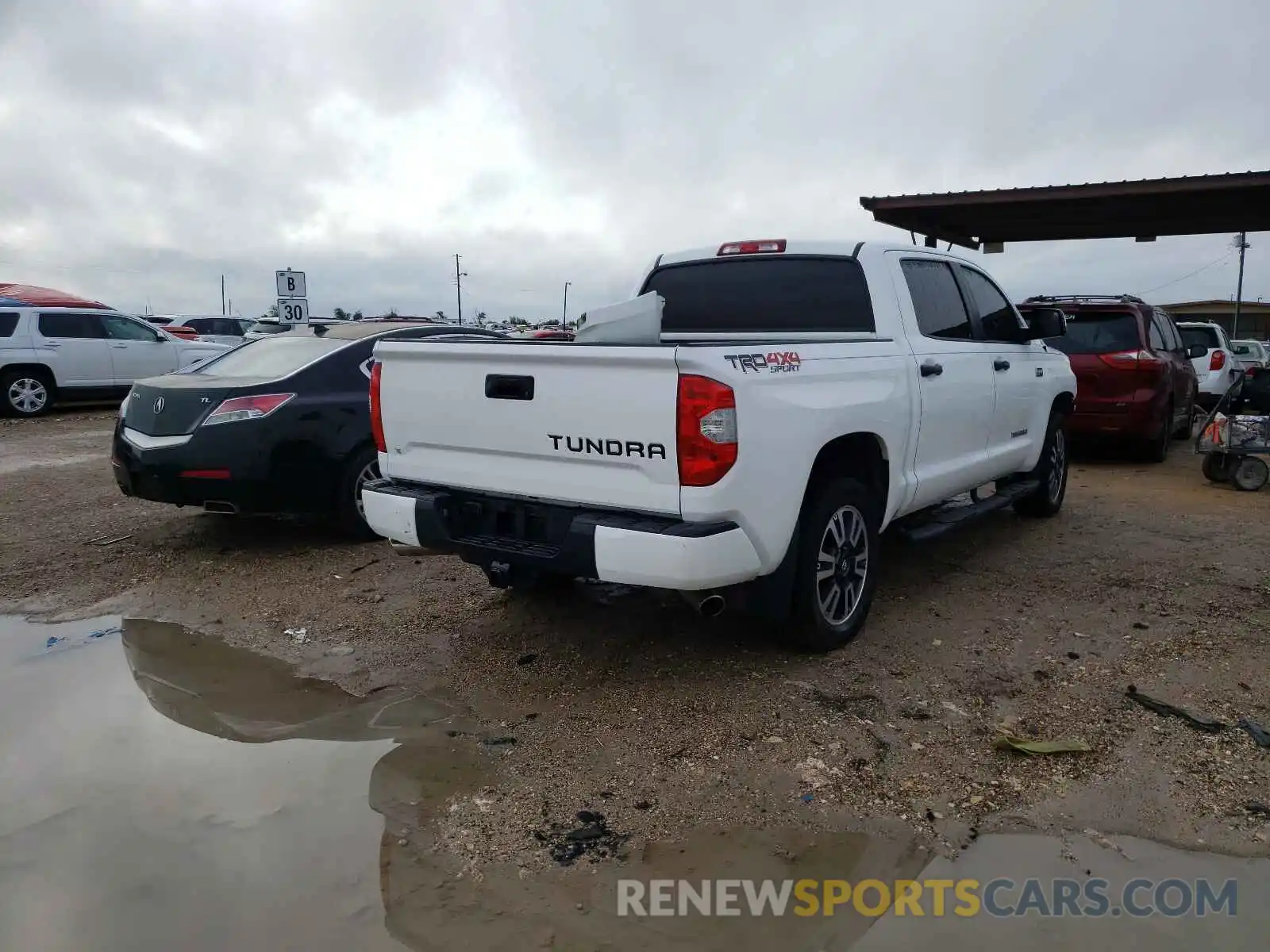 4 Photograph of a damaged car 5TFDY5F19KX779660 TOYOTA TUNDRA 2019