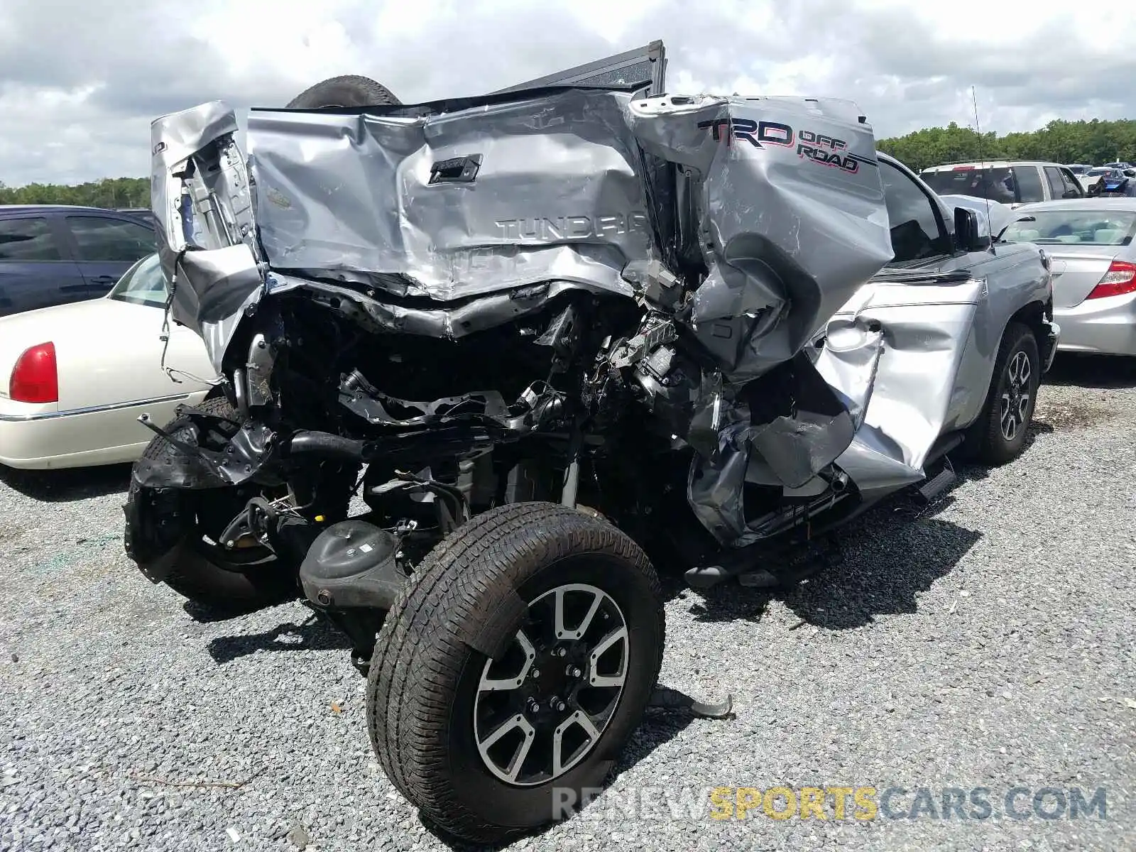 4 Photograph of a damaged car 5TFGY5F13KX251111 TOYOTA TUNDRA 2019