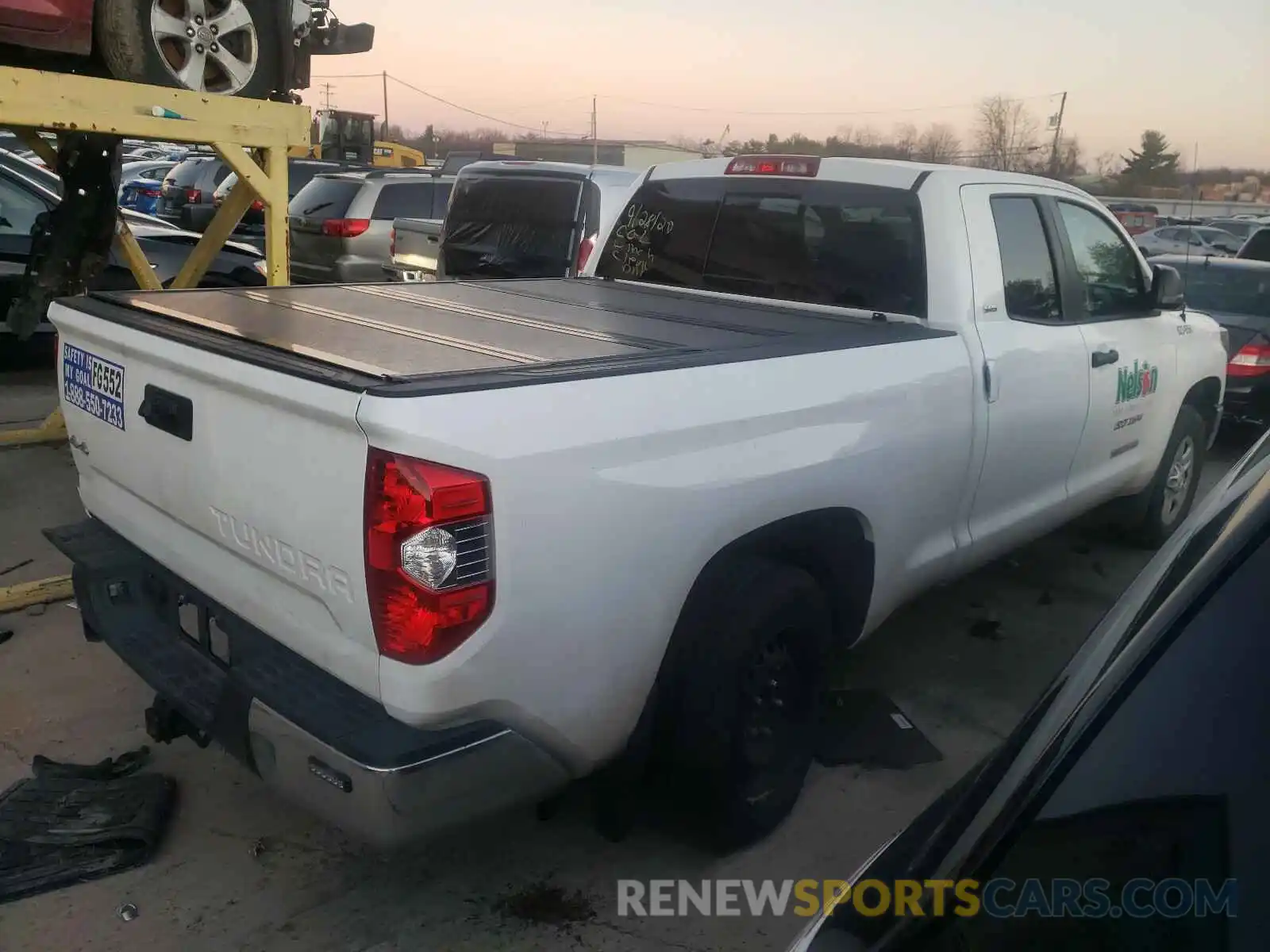 4 Photograph of a damaged car 5TFUM5F15KX083812 TOYOTA TUNDRA 2019