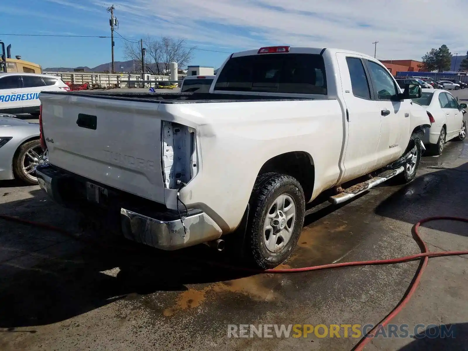 4 Photograph of a damaged car 5TFUW5F19KX813019 TOYOTA TUNDRA 2019