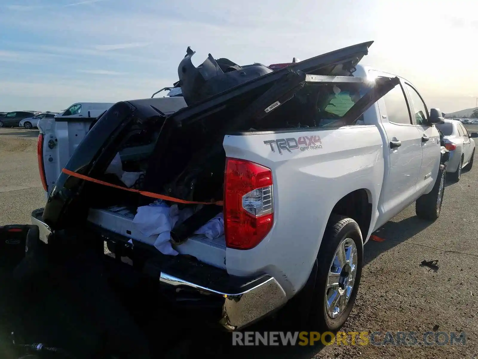 4 Photograph of a damaged car 5TFDY5F10LX880894 TOYOTA TUNDRA 2020