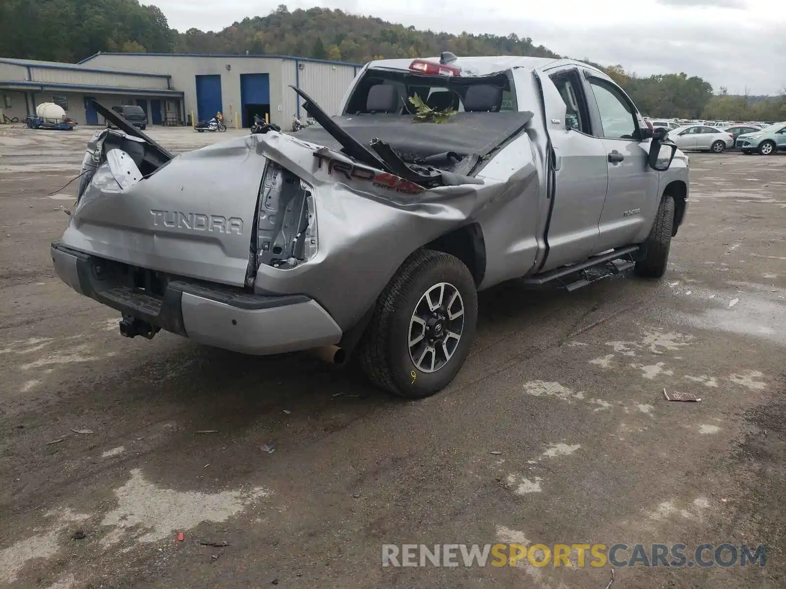 4 Photograph of a damaged car 5TFUY5F16LX954111 TOYOTA TUNDRA 2020