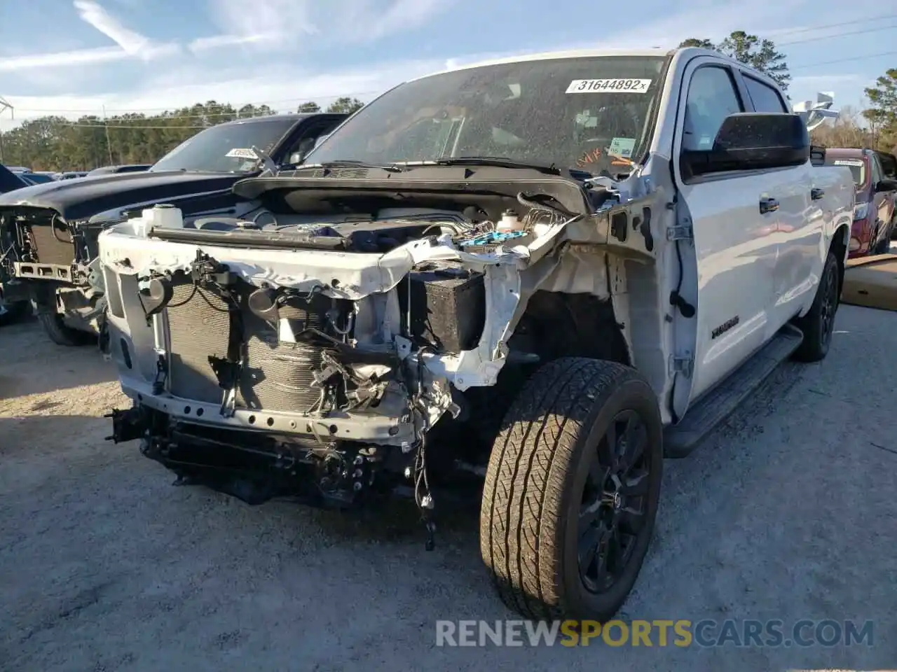 2 Photograph of a damaged car 5TFHY5F11MX021638 TOYOTA TUNDRA 2021