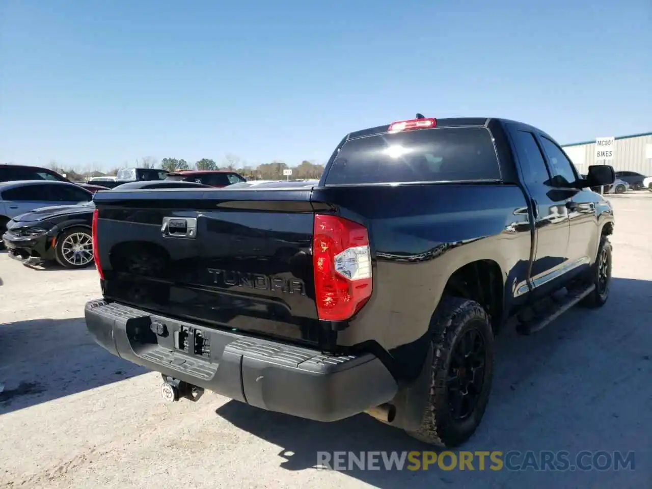 4 Photograph of a damaged car 5TFRY5F11MX273345 TOYOTA TUNDRA 2021