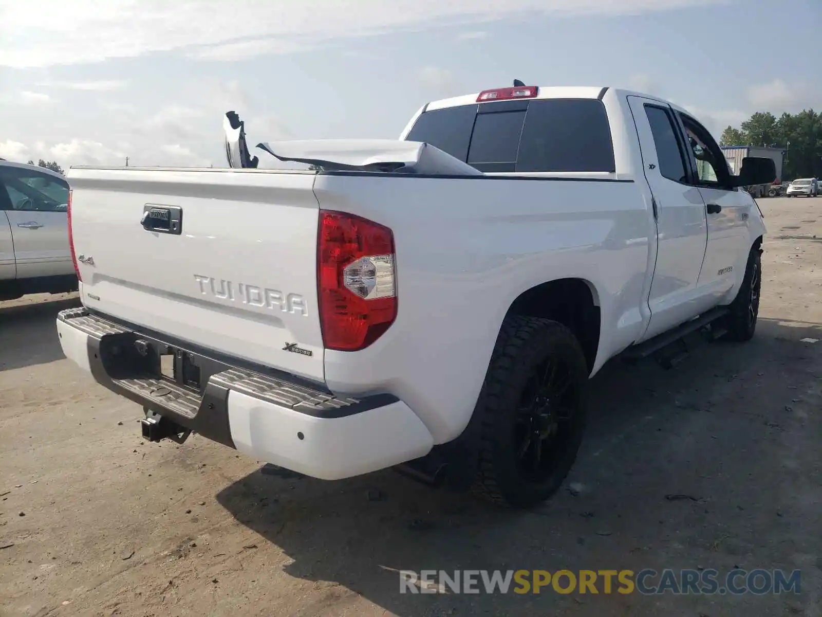 4 Photograph of a damaged car 5TFUY5F1XMX998825 TOYOTA TUNDRA 2021