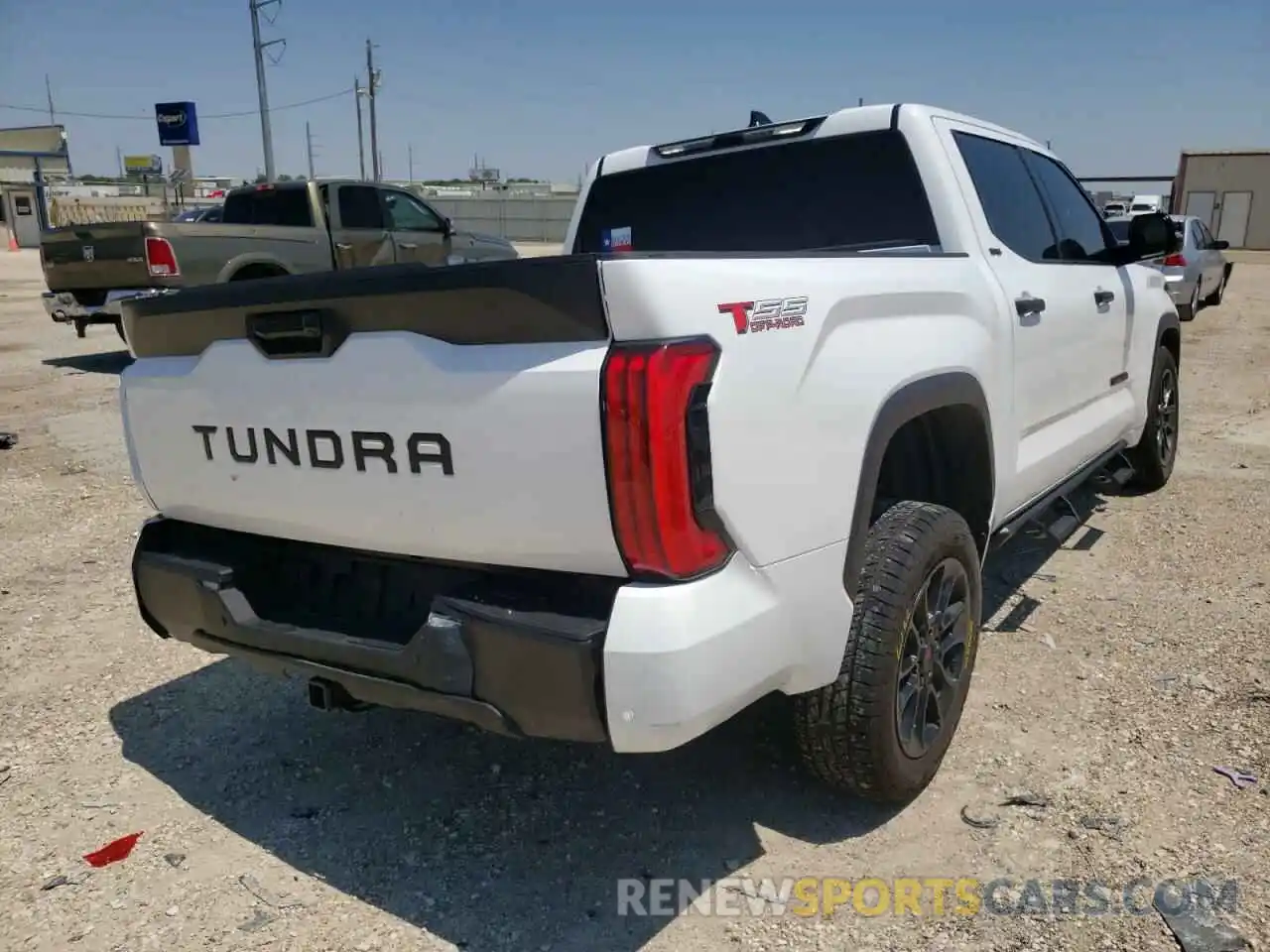 4 Photograph of a damaged car 5TFLA5AB1NX007335 TOYOTA TUNDRA 2022