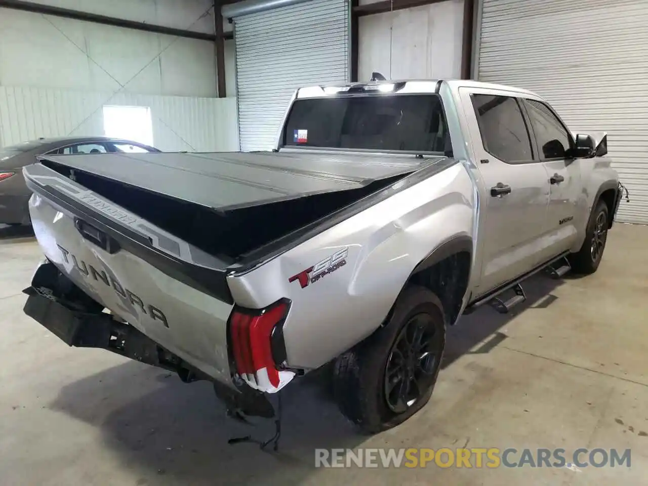 4 Photograph of a damaged car 5TFLA5ABXNX004482 TOYOTA TUNDRA 2022