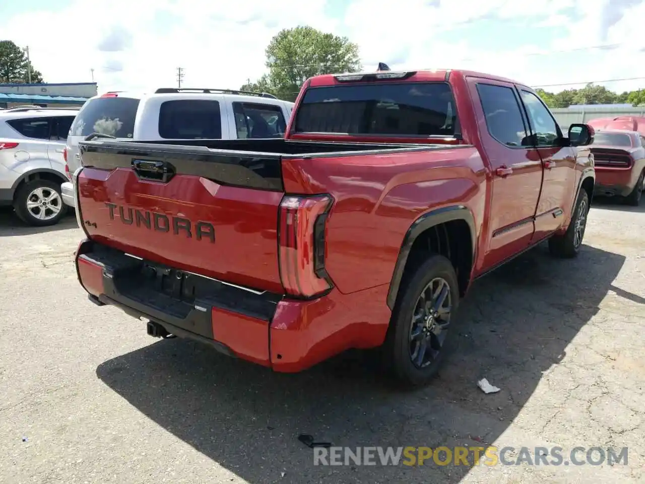 4 Photograph of a damaged car 5TFNA5DB2NX021913 TOYOTA TUNDRA 2022