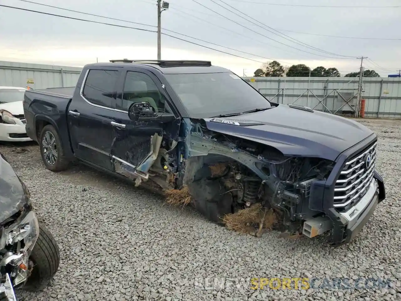 4 Photograph of a damaged car 5TFVC5DB4PX015981 TOYOTA TUNDRA 2023