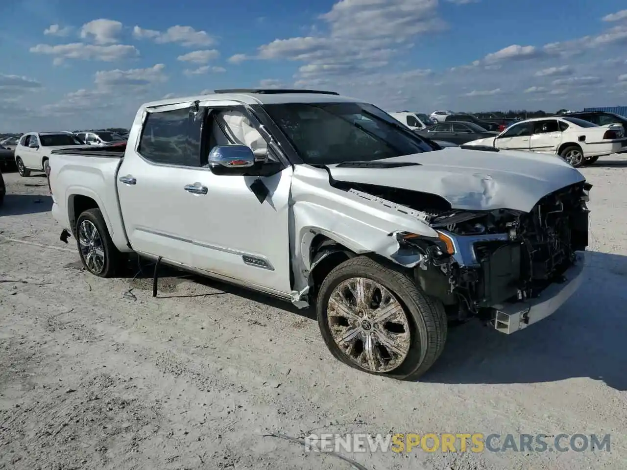 4 Photograph of a damaged car 5TFVC5DBXPX028945 TOYOTA TUNDRA 2023