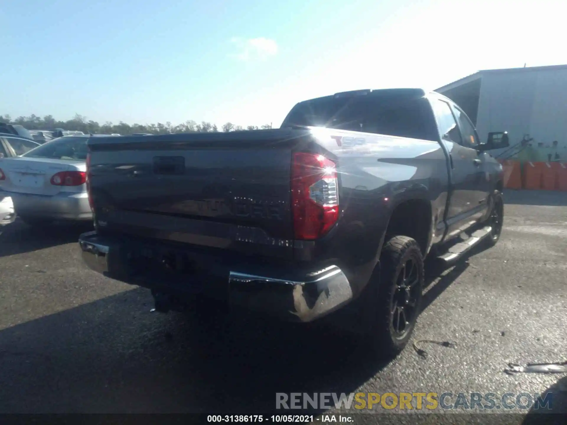 4 Photograph of a damaged car 5TFRM5F11KX143638 TOYOTA TUNDRA 2WD 2019