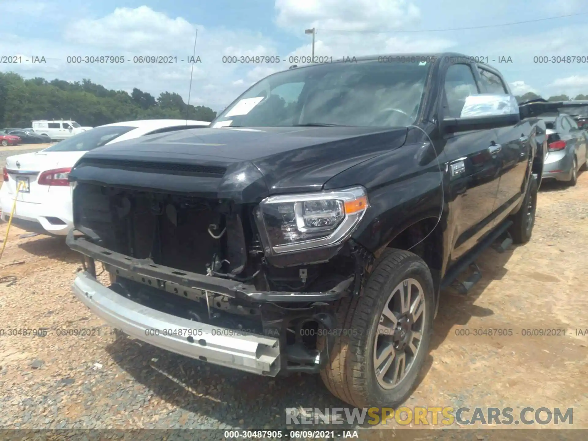 2 Photograph of a damaged car 5TFAY5F16KX856360 TOYOTA TUNDRA 4WD 2019