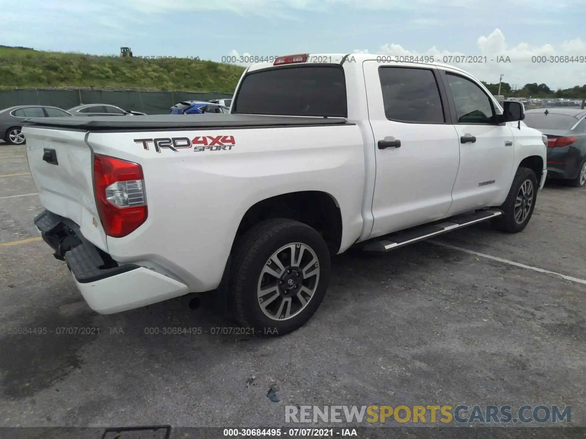 4 Photograph of a damaged car 5TFDW5F18KX793510 TOYOTA TUNDRA 4WD 2019