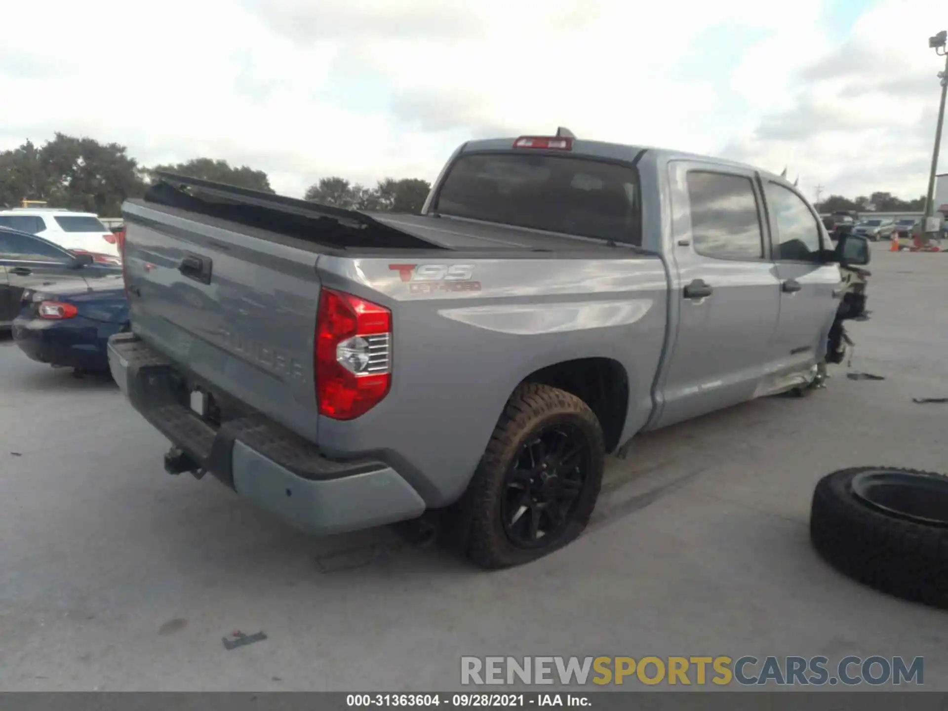 4 Photograph of a damaged car 5TFDY5F14MX008624 TOYOTA TUNDRA 4WD 2021