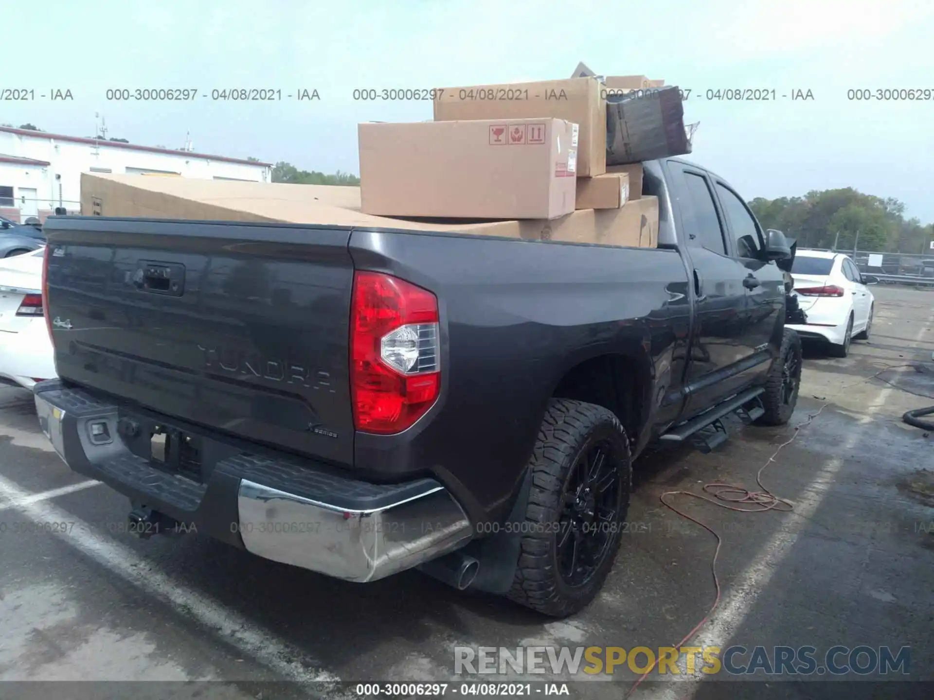 4 Photograph of a damaged car 5TFUY5F12MX980044 TOYOTA TUNDRA 4WD 2021