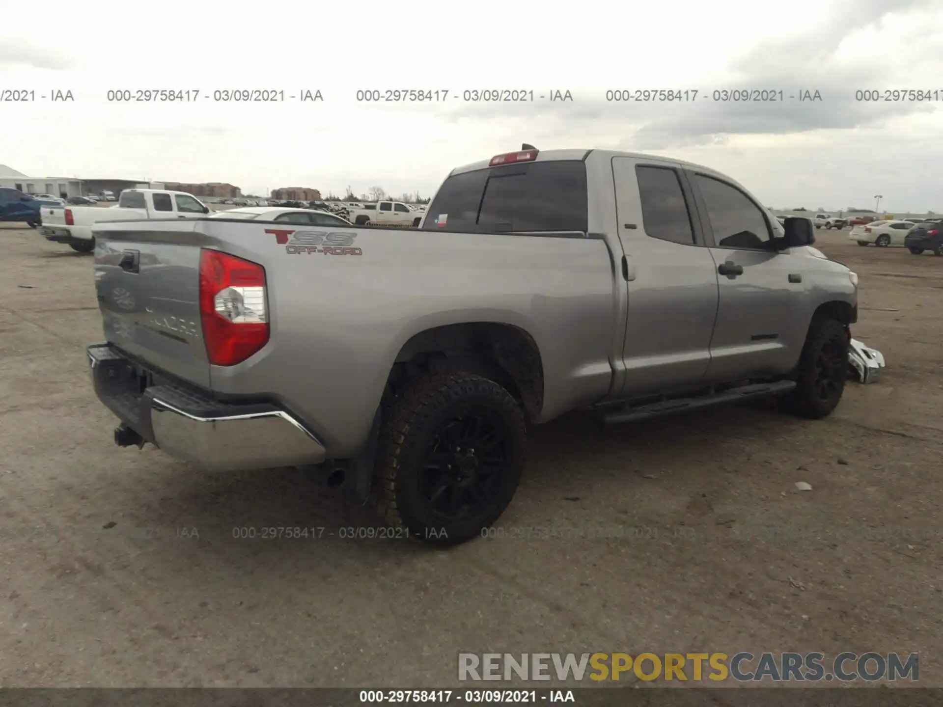 4 Photograph of a damaged car 5TFUY5F14MX957316 TOYOTA TUNDRA 4WD 2021