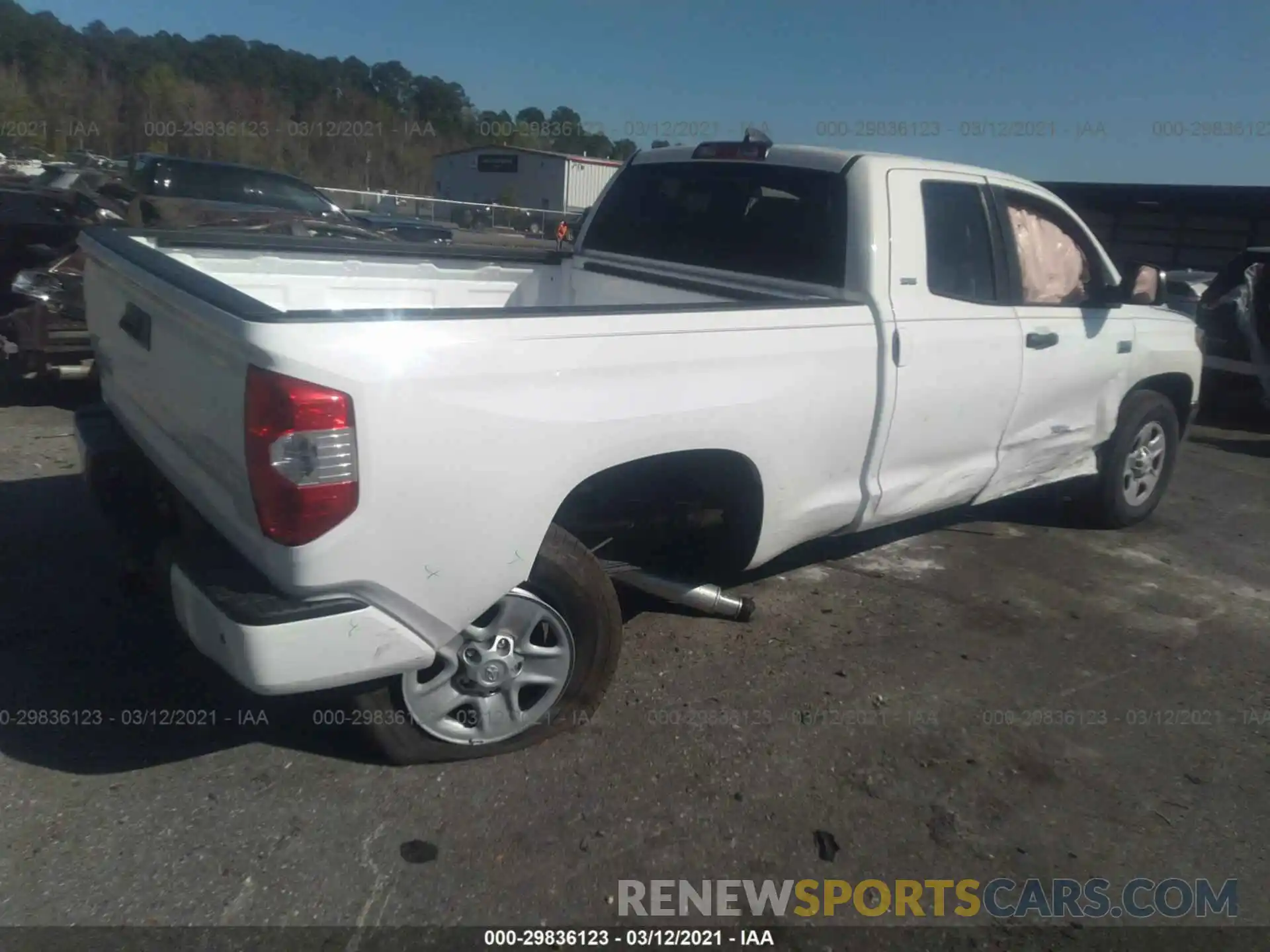 4 Photograph of a damaged car 5TFUY5F1XMX989820 TOYOTA TUNDRA 4WD 2021