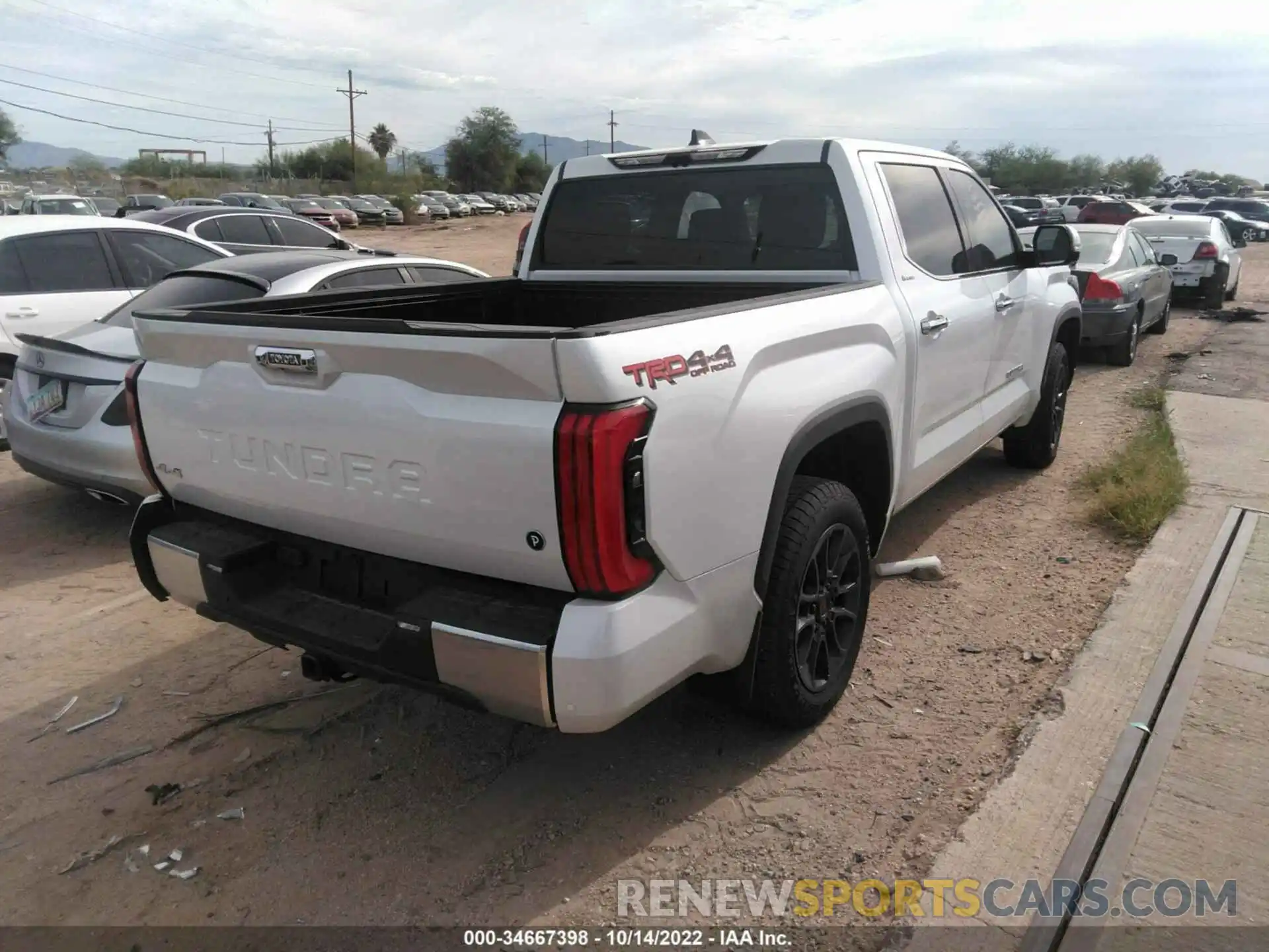 4 Photograph of a damaged car 5TFJC5DB6NX008476 TOYOTA TUNDRA 4WD 2022