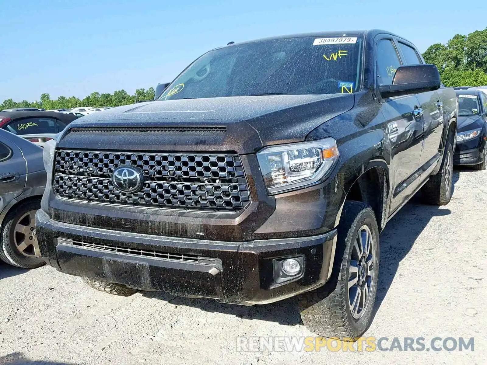 2 Photograph of a damaged car 5TFAY5F19KX813874 TOYOTA TUNDRA CRE 2019