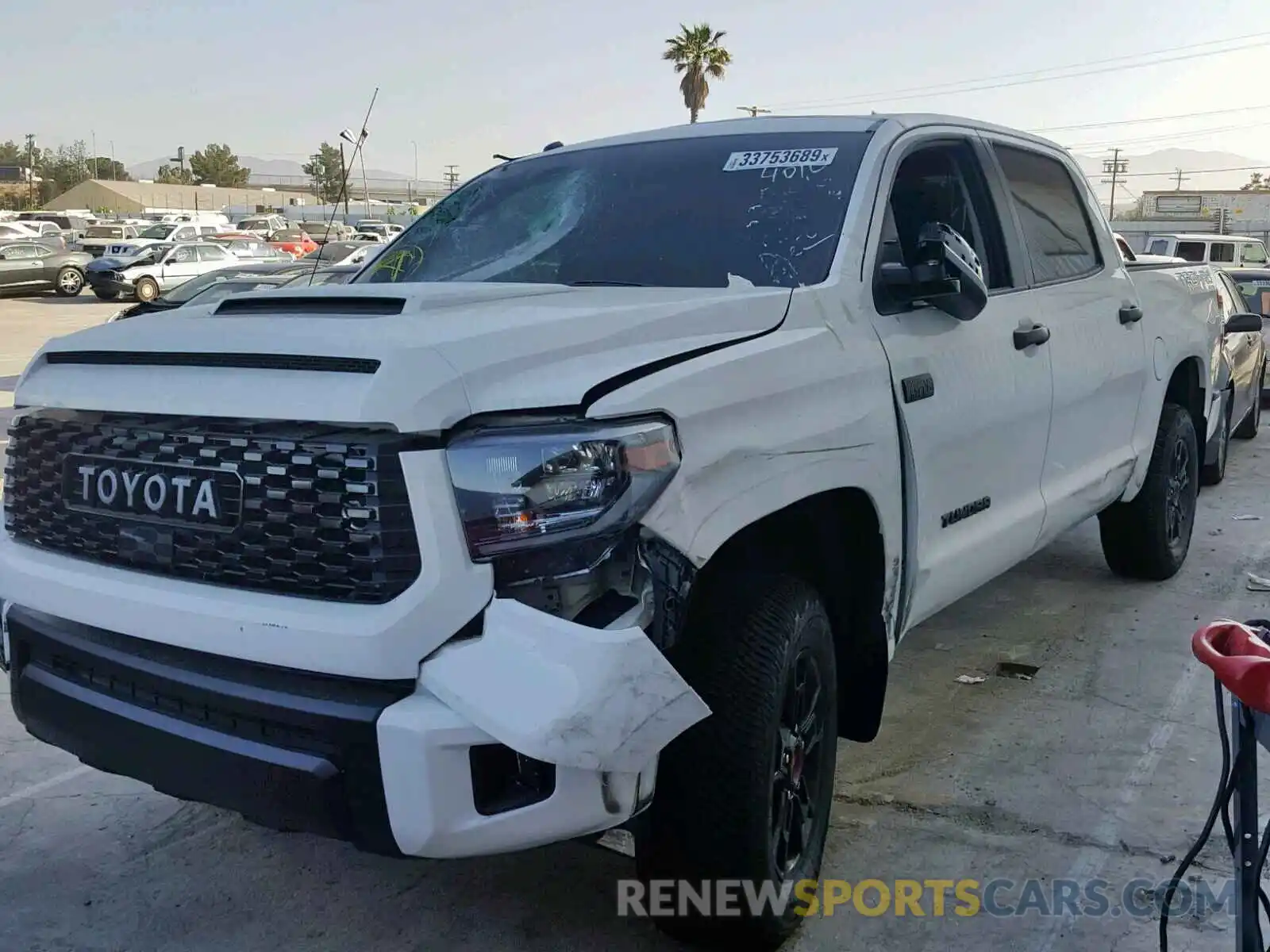 2 Photograph of a damaged car 5TFDY5F14KX810233 TOYOTA TUNDRA CRE 2019