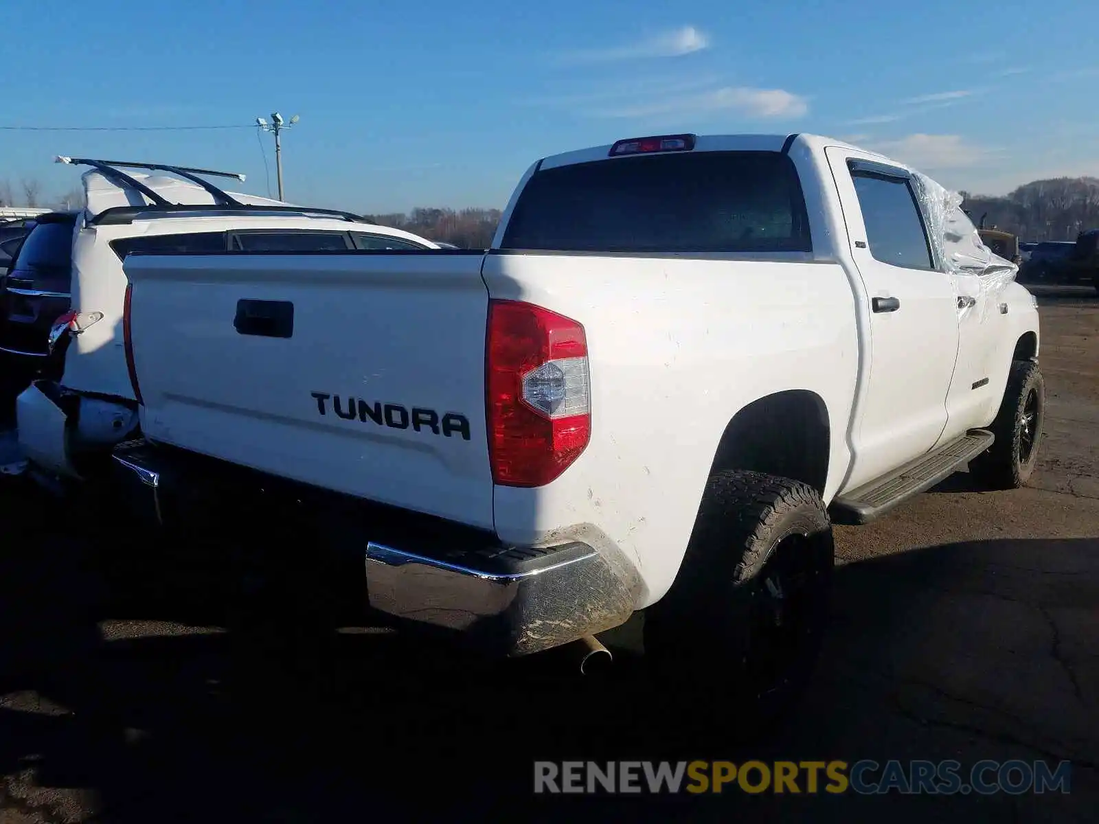 4 Photograph of a damaged car 5TFDY5F17KX787918 TOYOTA TUNDRA CRE 2019