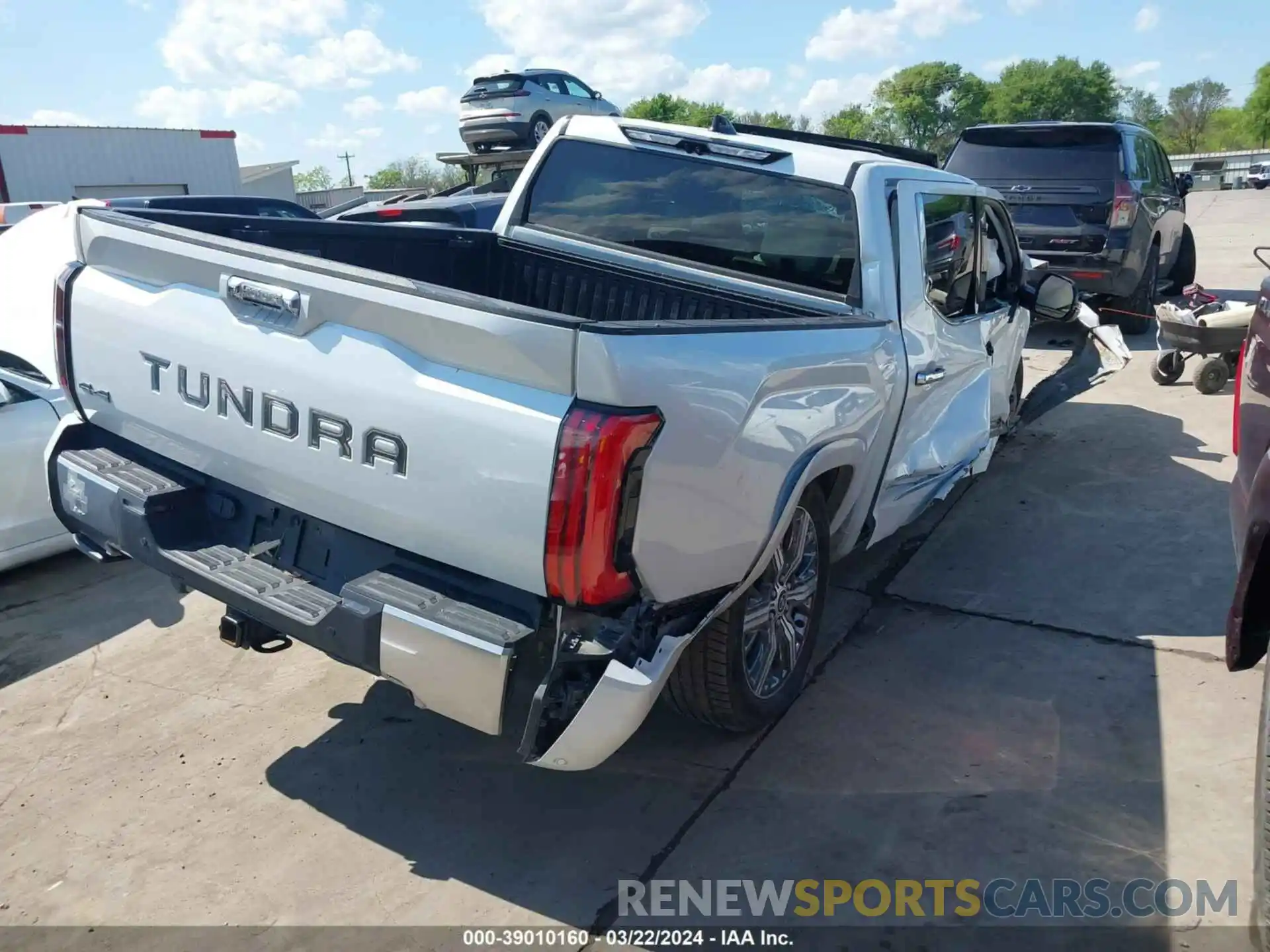 4 Photograph of a damaged car 5TFVC5DB2NX002773 TOYOTA TUNDRA HYBRID 2022