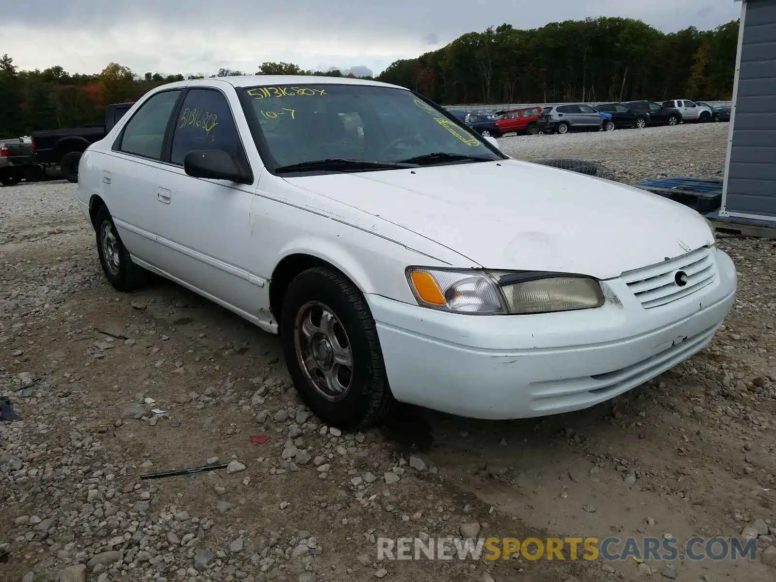 1 Photograph of a damaged car 4T1BG22K1VU040663 TOYOTA UEX 2097