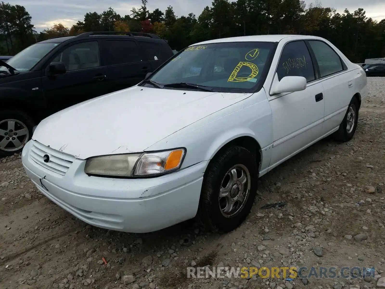 2 Photograph of a damaged car 4T1BG22K1VU040663 TOYOTA UEX 2097