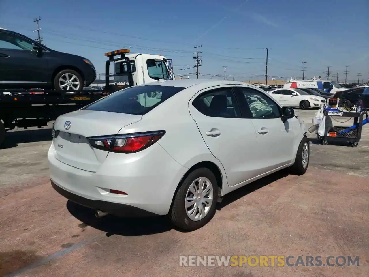 4 Photograph of a damaged car 3MYDLBYV0KY519113 TOYOTA YARIS 2019