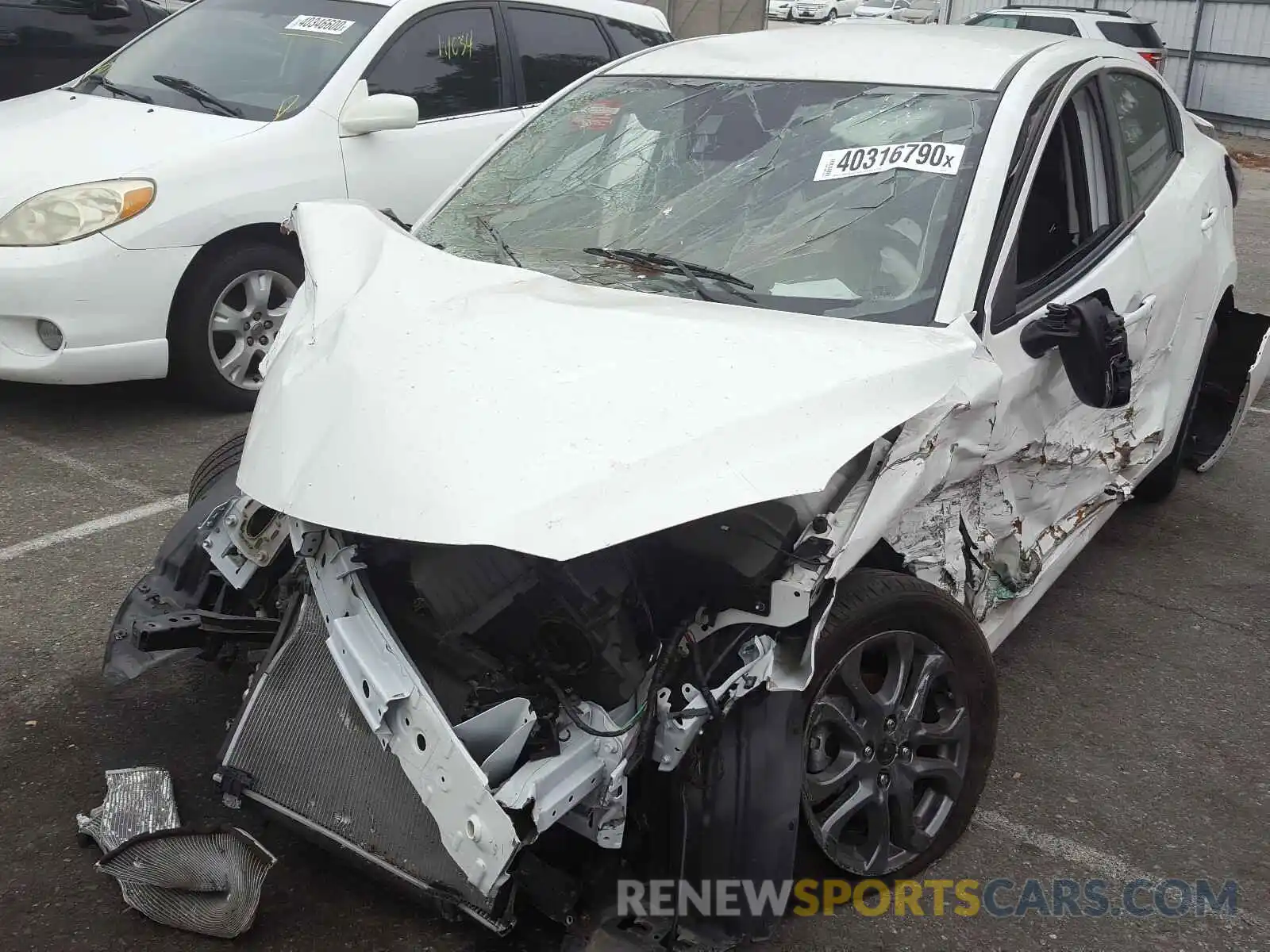 2 Photograph of a damaged car 3MYDLBYV2KY522272 TOYOTA YARIS 2019