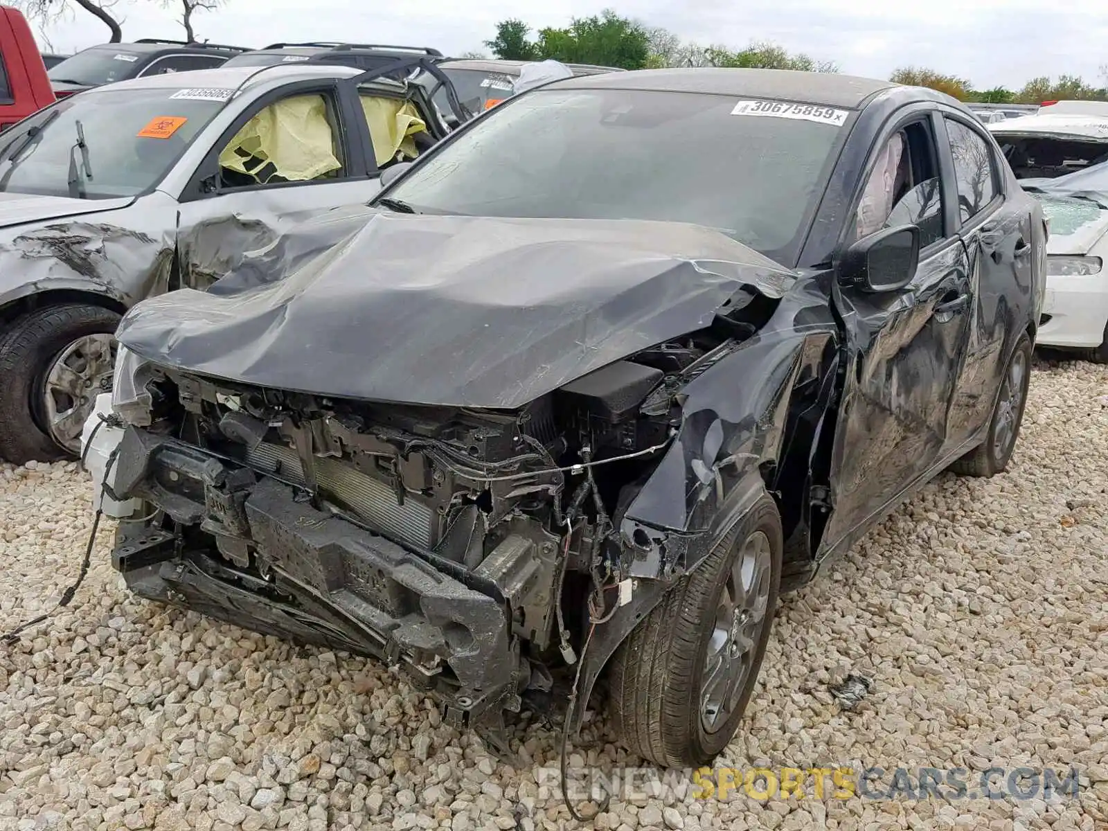 2 Photograph of a damaged car 3MYDLBYV5KY519947 TOYOTA YARIS 2019