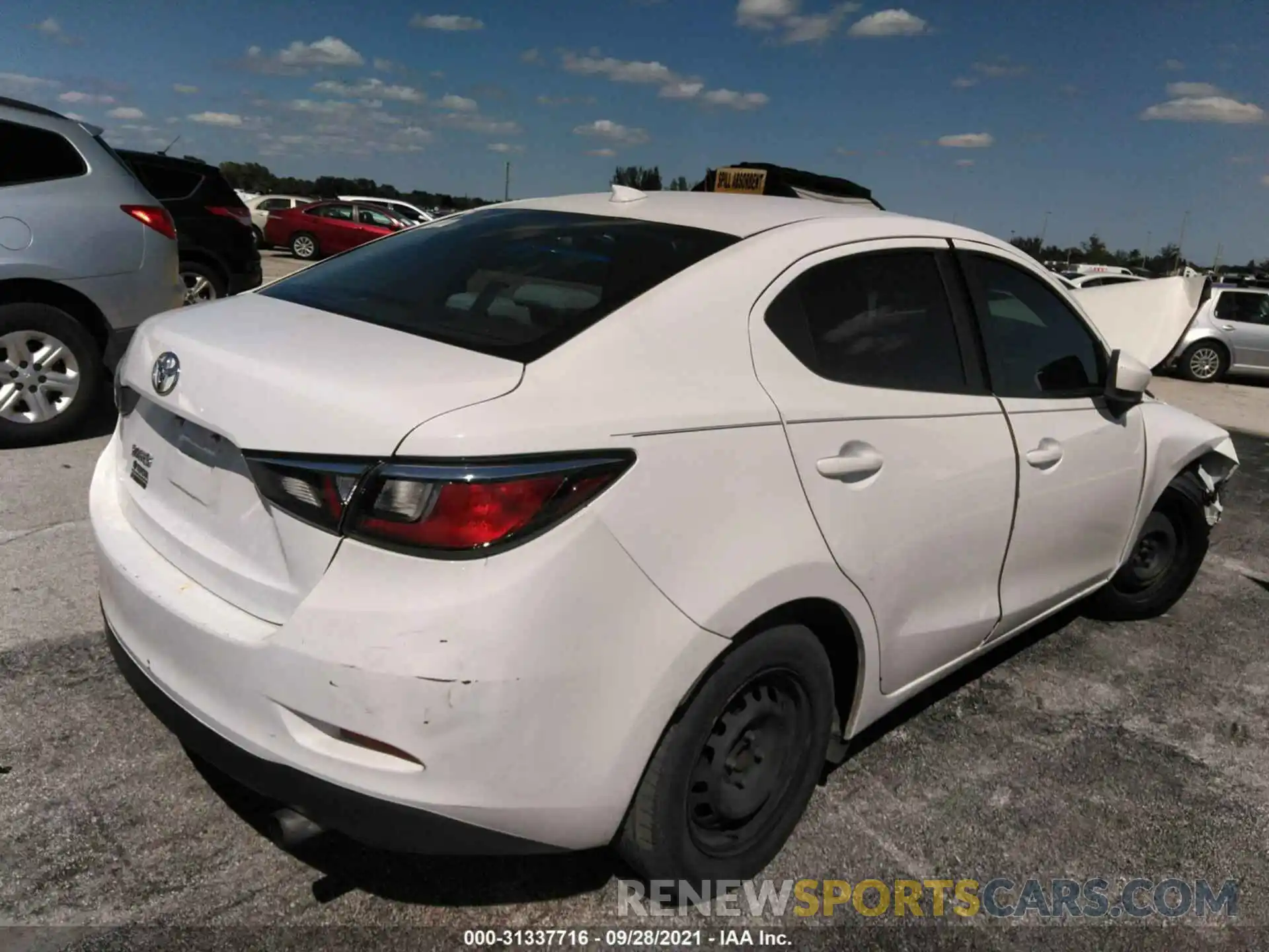 4 Photograph of a damaged car 3MYDLBYV0KY513733 TOYOTA YARIS SEDAN 2019